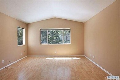 Huge Master Suite boasts vaulted ceilings and walk