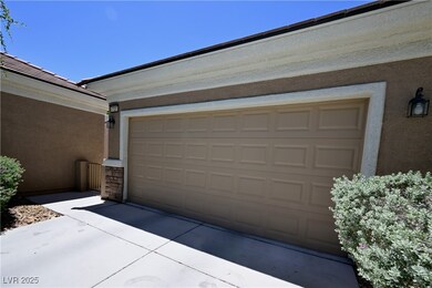 Garage featuring driveway