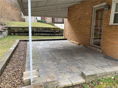 COVERED PATIO OFF THE KITCHEN.