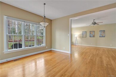 Bright airy kitchen overlooking back yard.