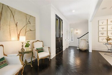 Front entrance with beautifully stained wood floor