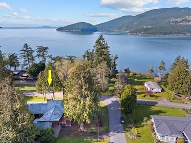 House on Northwest corner of Salmon Run & West Shore.