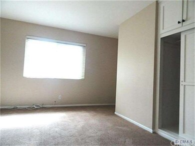 One of three bedrooms, all with ample closet space