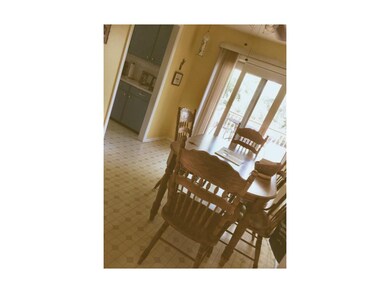 Cozy Dinette. Opening to deck and huge backyard wi