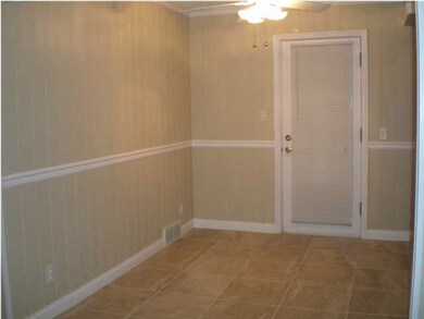 Dining area off living room and connected to kitch