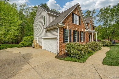 Side entry garage of home with a garage lends to p