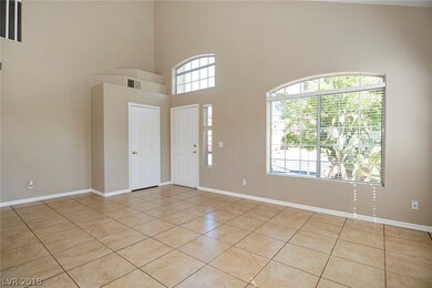Entry foyer with coat closet and pot shelving