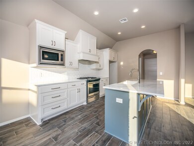 Gorgeous white Kitchen with marble countertops and