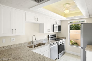 Kitchen is light and bright with large window