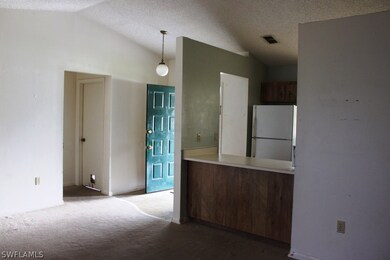 Breakfast Bar & Pass-Thru .. Vaulted Ceilings give