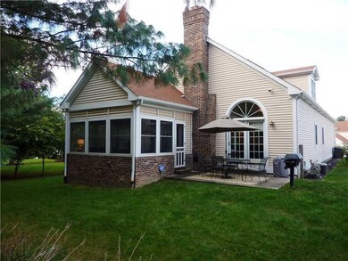 Exterior Back. Private backyard with patio.
