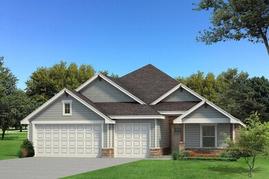 View of front facade featuring a garage, a shingle