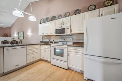 Open and bright kitchen space with granite countertops!