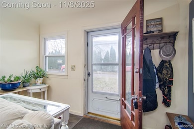 Entryway featuring baseboards