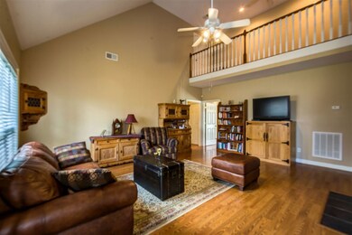 With Cozy Fireplace, Hardwood Floor, Vaulted Ceili