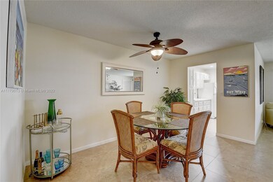 ANGLED VIEW OF DINING AREA AND KITCHEN 