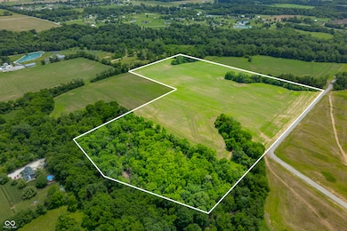 aerial view of sparsely populated area featuring property boundaries highlighted