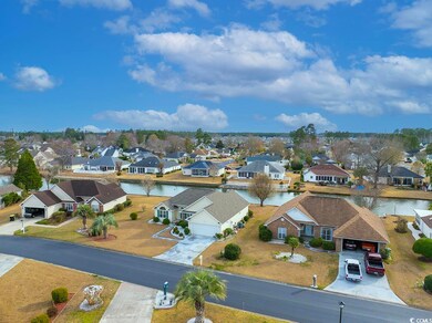 Bird's eye view with a water view and a residentia