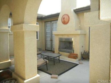 Outside Patio at Front Entrance with Fireplace