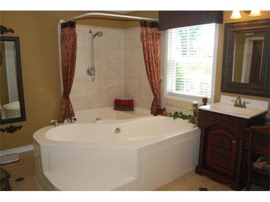 This custom master bath features, his & her's sink