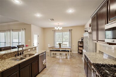 Kitchen looking onto breakfast area