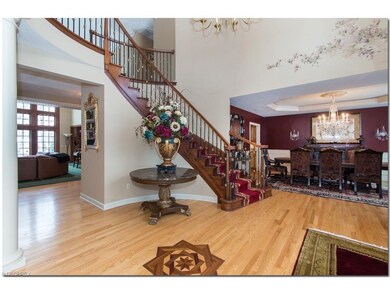 Grand Two Story Foyer with Curved Staircase, Hand 