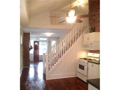 Kitchen. Dramatic vaulted ceilings and view to lof