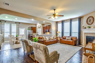 The open concept allows for a warm and inviting atmosphere.