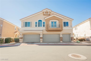 View of front of home with a garage, stone siding,