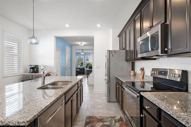 8497 Starlight Loop, Parrish, FL 34219 - photo 6