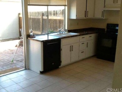 Kitchen Opens To Brick Patio & Eating Area