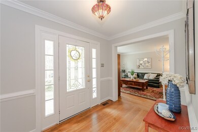 Entryway featuring light wood-style floors, visibl