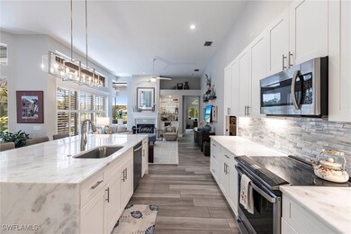 Kitchen with appliances with stainless steel finis