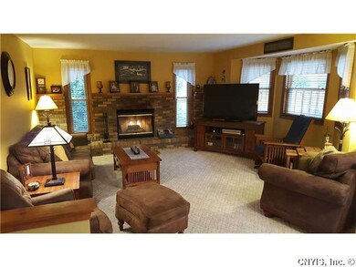 Family Room. Warm & inviting family room w/cozy wo