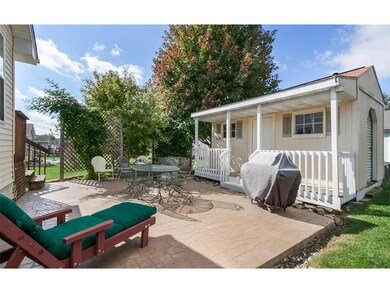 Rear patio and charming garden shed