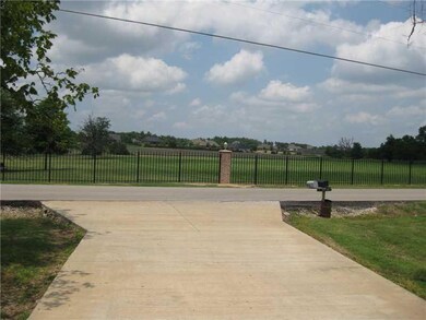 Land. View coming out of the driveway looking to the north.