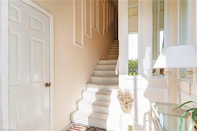 Entryway from front door and attached garage 2625 Marshcreek Ln Unit 201