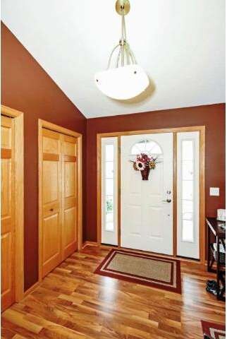 Spacious foyer with double closets with 6 panel oa