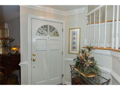 Foyer, hardwood floors, chair rail, opens to 2nd l