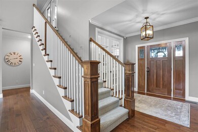 Foyer greets you with hardwood floors and access to front office.