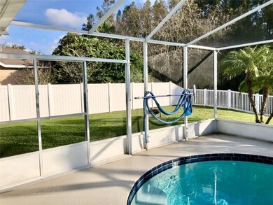 POOL/SIDE VIEW OF YARD