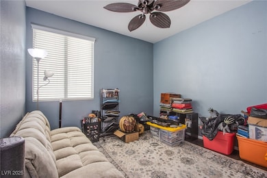 Recreation room with a ceiling fan