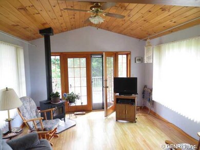 Family Room Family room with vaulted ceiling and a