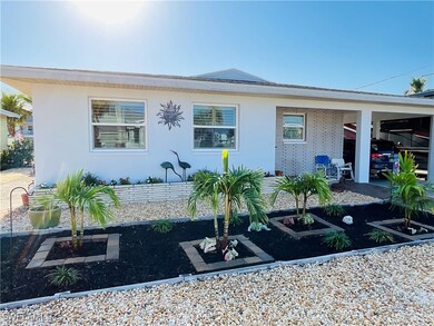View of front of property with stucco siding and a