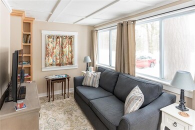 The living room has lots of windows...