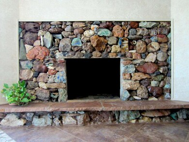 Fireplace w/ seat & rock surround