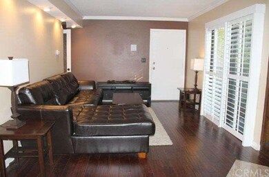 Living Room w/beautiful wood flooring, custom wide