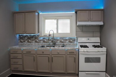 kitchen lighted cupboard area