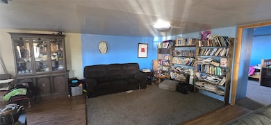 Living room featuring wood finished floors
