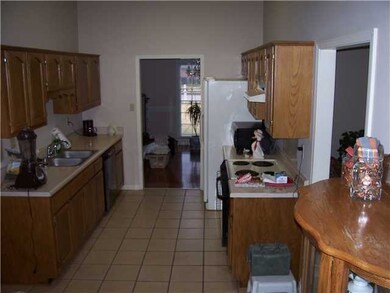 The kitchen is approximately 10' x 10'. Floor is t